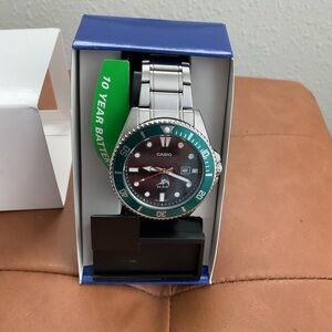 Casio Silver Watch with Green Bezel